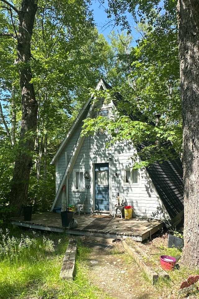 32 Dinsmore Ln, Whiting, ME 04691 - back of property with a wooden deck
