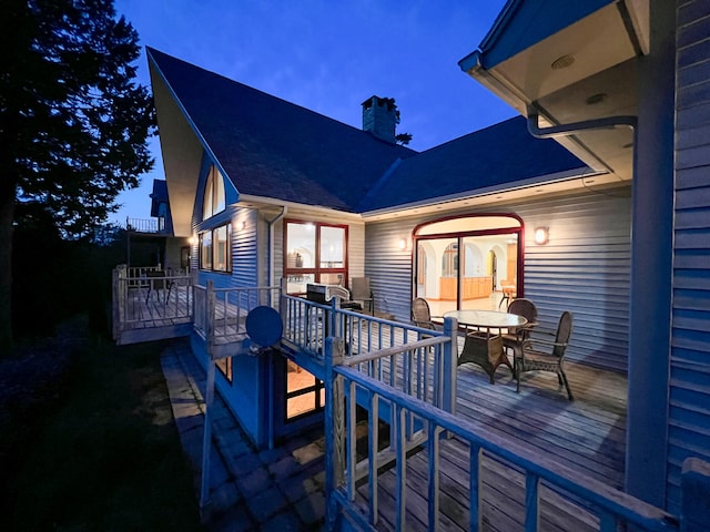 exterior space featuring a wooden deck