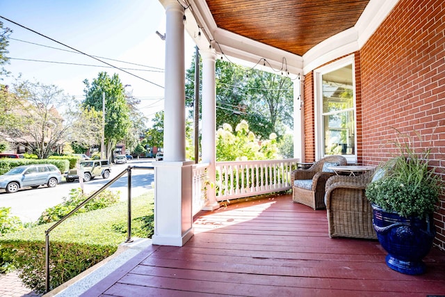 wooden terrace with covered porch