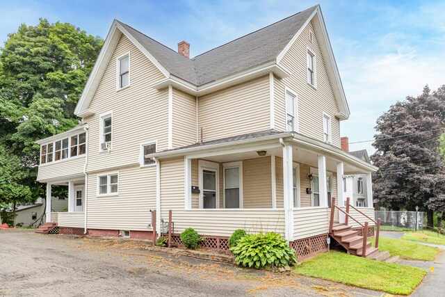 exterior space featuring covered porch