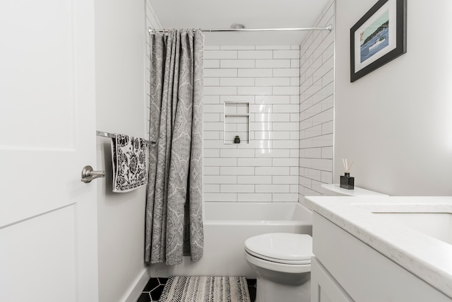 full bathroom featuring shower / bath combo, vanity, and toilet