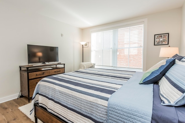 bedroom featuring hardwood / wood-style flooring