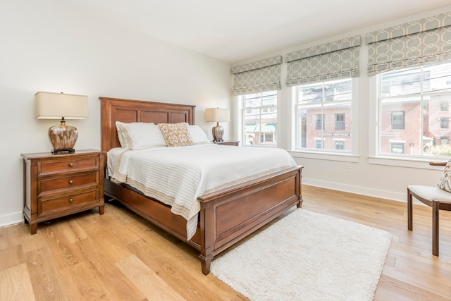 bedroom with light wood-type flooring