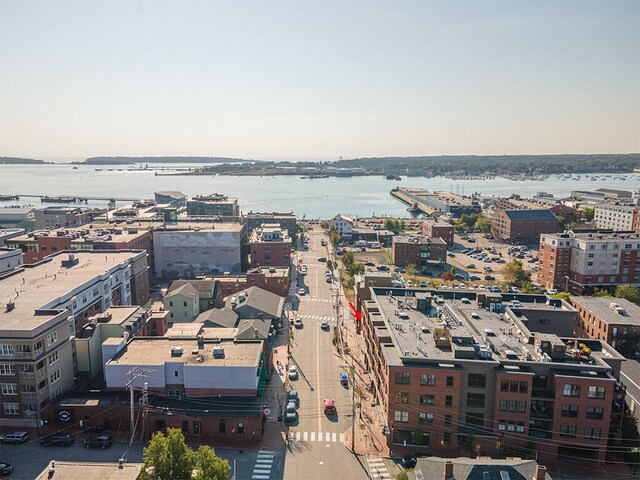 property's view of city with a water view