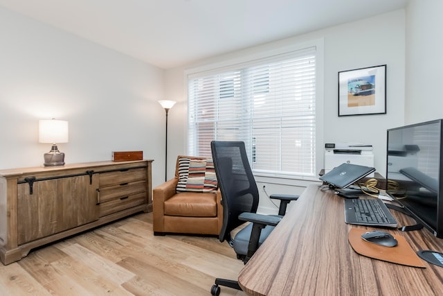 office area with light wood-type flooring