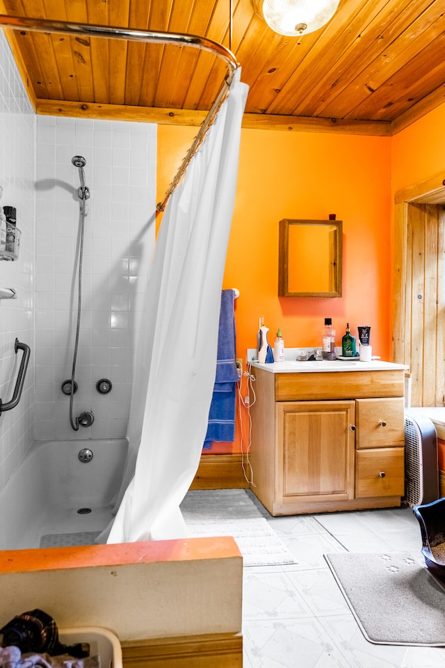 bathroom with wood ceiling, shower / tub combo, and vanity