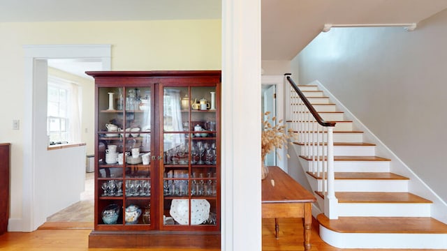 staircase featuring hardwood / wood-style flooring