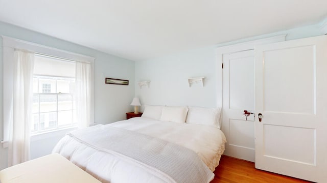 bedroom featuring light hardwood / wood-style floors