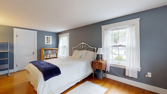 bedroom featuring hardwood / wood-style floors