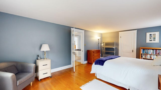 bedroom with light wood-type flooring