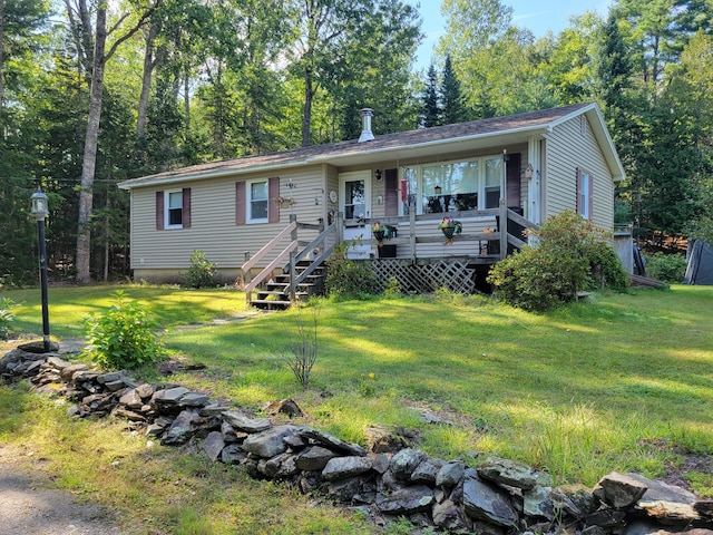 458 Lambert Rd, Brewer, ME 04412 - view of front of house featuring a front lawn and a porch