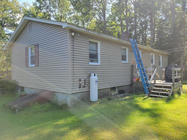 458 Lambert Rd, Brewer, ME 04412 - back of house featuring a wooden deck and a lawn