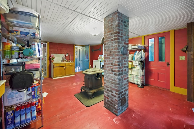 interior space with concrete floors and ornate columns