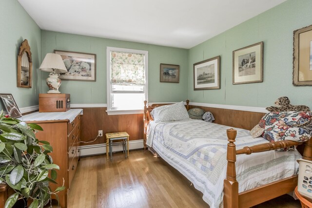 51 Malone Rd, Westport Island, ME 04578 - bedroom featuring wood finished floors and baseboard heating