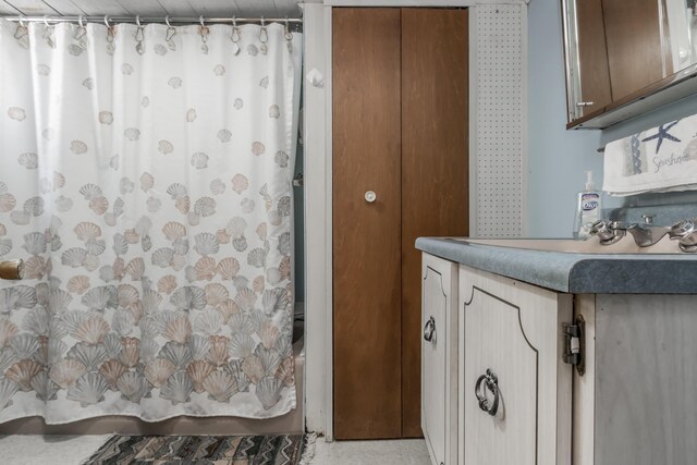 bathroom with vanity and a shower with curtain