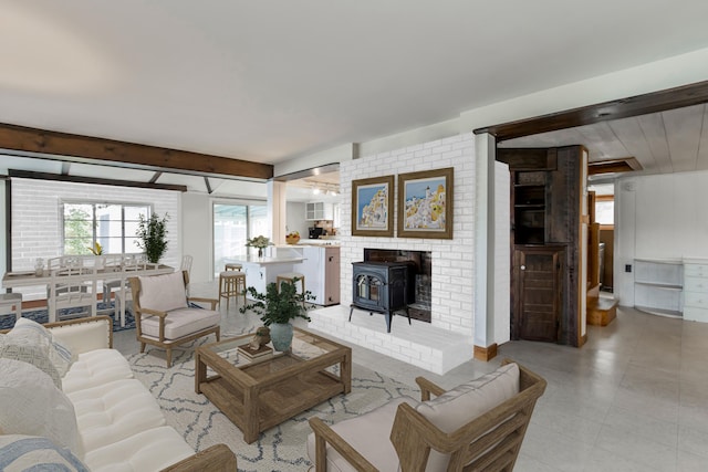 living room featuring a wood stove