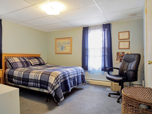 bedroom featuring a paneled ceiling, carpet flooring, and baseboard heating