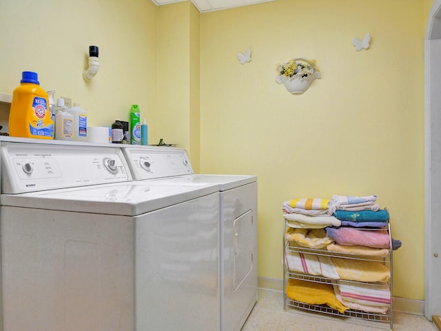 washroom with independent washer and dryer