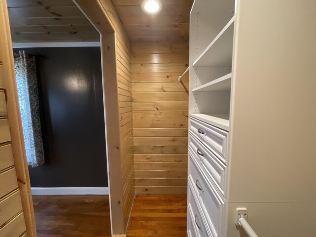 walk in closet featuring hardwood / wood-style floors