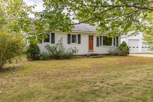 ranch-style house with a front yard and a garage