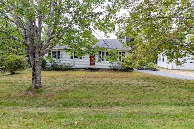 view of front of house with a front yard