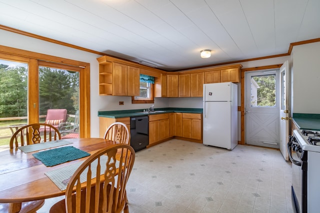 kitchen with white appliances, ornamental molding, and sink