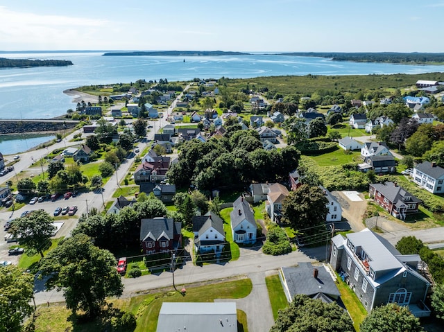 birds eye view of property featuring a water view and a residential view