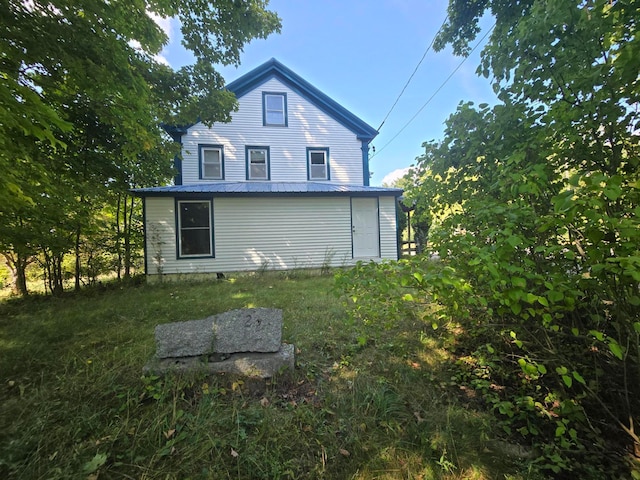 exterior space with a lawn