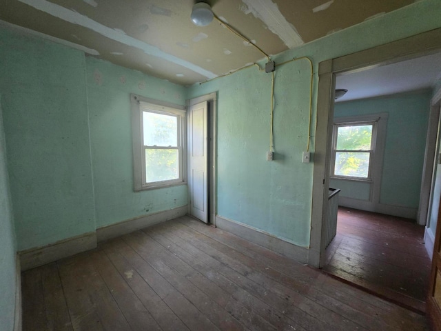 spare room featuring hardwood / wood-style floors