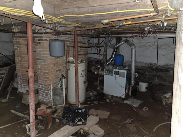 utility room featuring a heating unit and water heater