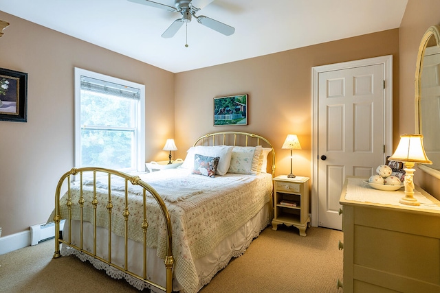 bedroom featuring ceiling fan and light colored carpet