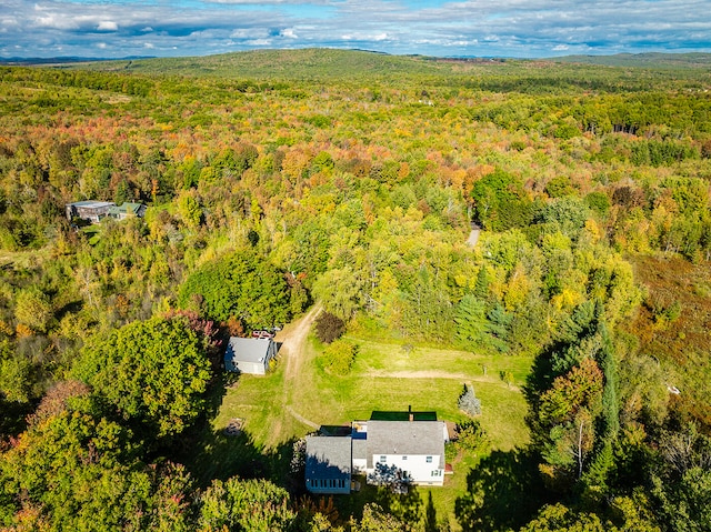 aerial view featuring a forest view