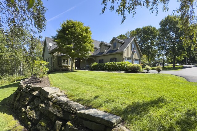 exterior space with a front yard