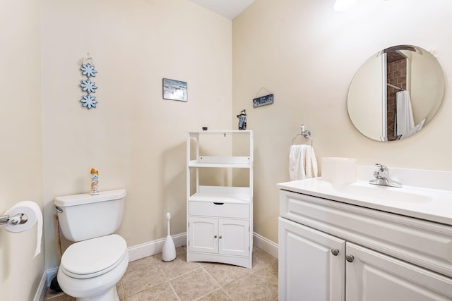 bathroom with vanity, toilet, a shower with shower curtain, and tile patterned floors