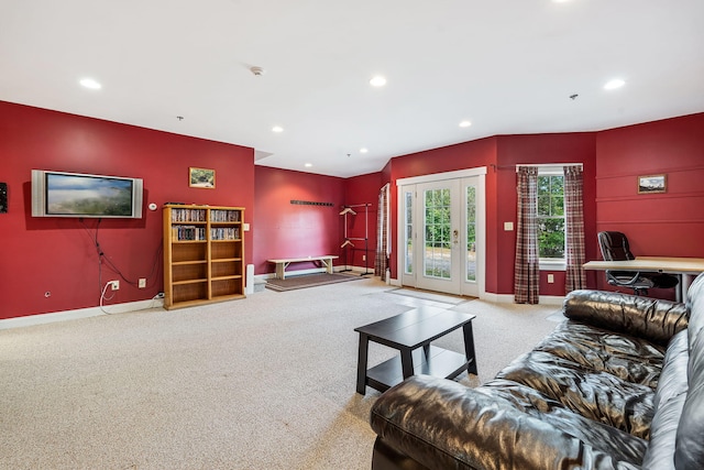 living room with carpet floors and french doors