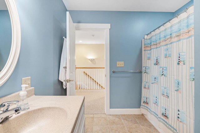 bathroom with vanity and tile patterned flooring