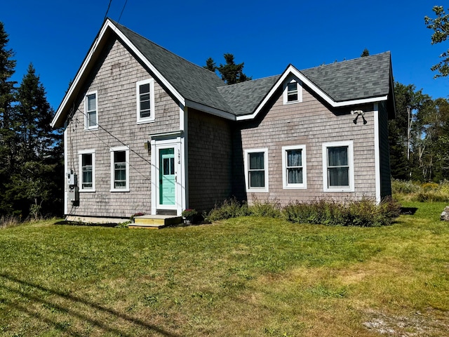 view of front of house featuring a front lawn