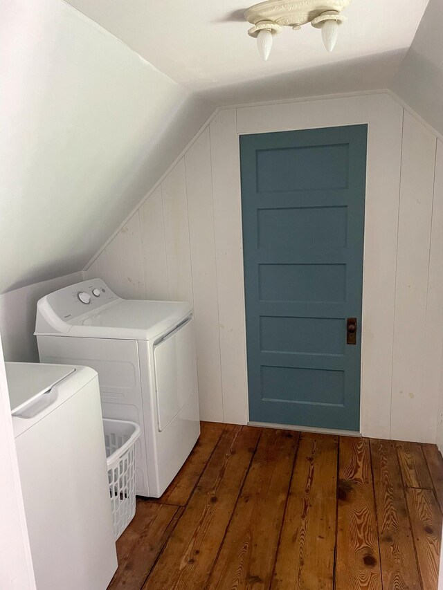 laundry area featuring dark hardwood / wood-style floors and separate washer and dryer