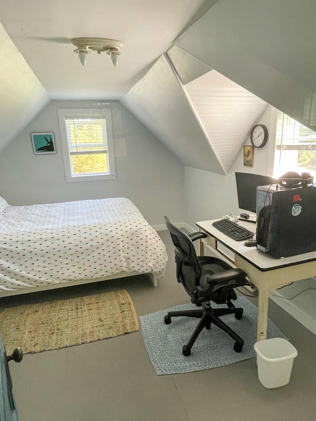 bedroom featuring lofted ceiling