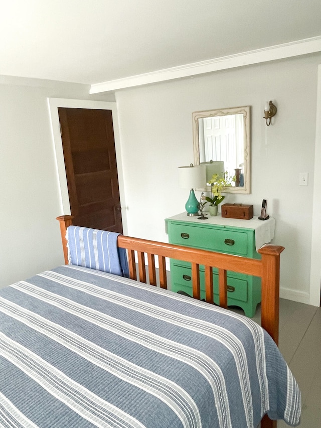 bedroom featuring baseboards