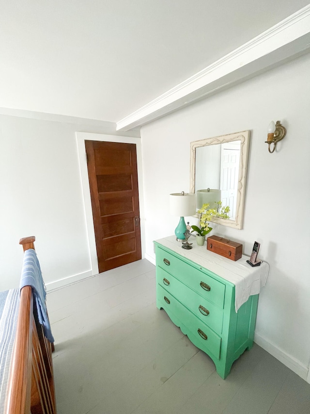 bedroom featuring baseboards