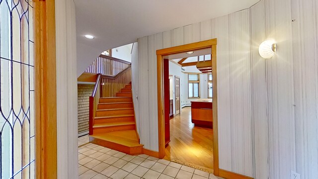 corridor featuring light wood-type flooring and a baseboard radiator