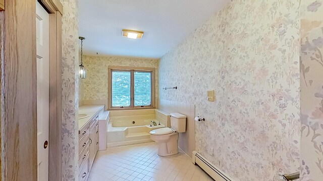 bathroom with a tub, tile patterned flooring, toilet, and vanity