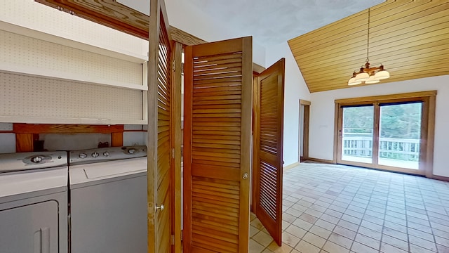 washroom with separate washer and dryer and light tile patterned floors