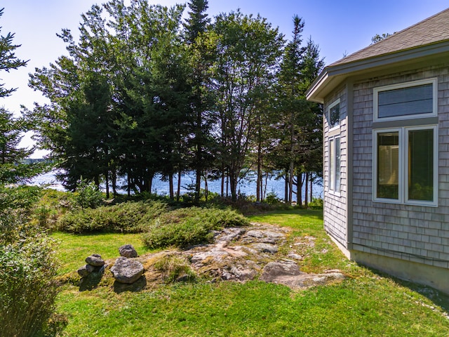 view of yard with a water view