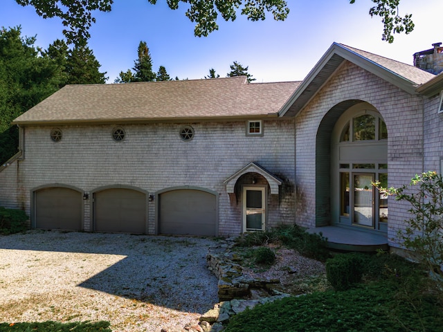 view of front of property with a garage