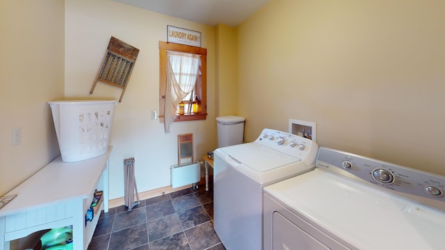 clothes washing area with washing machine and clothes dryer