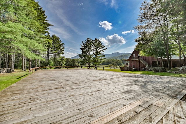 wooden deck with a mountain view