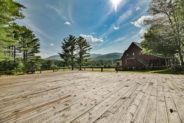 deck with a mountain view and stairs