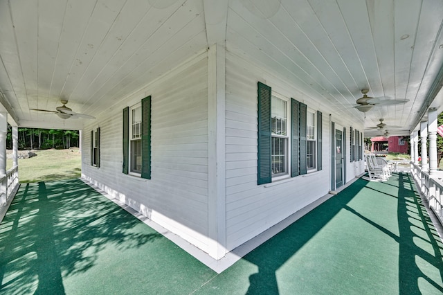 view of property exterior with a porch and ceiling fan